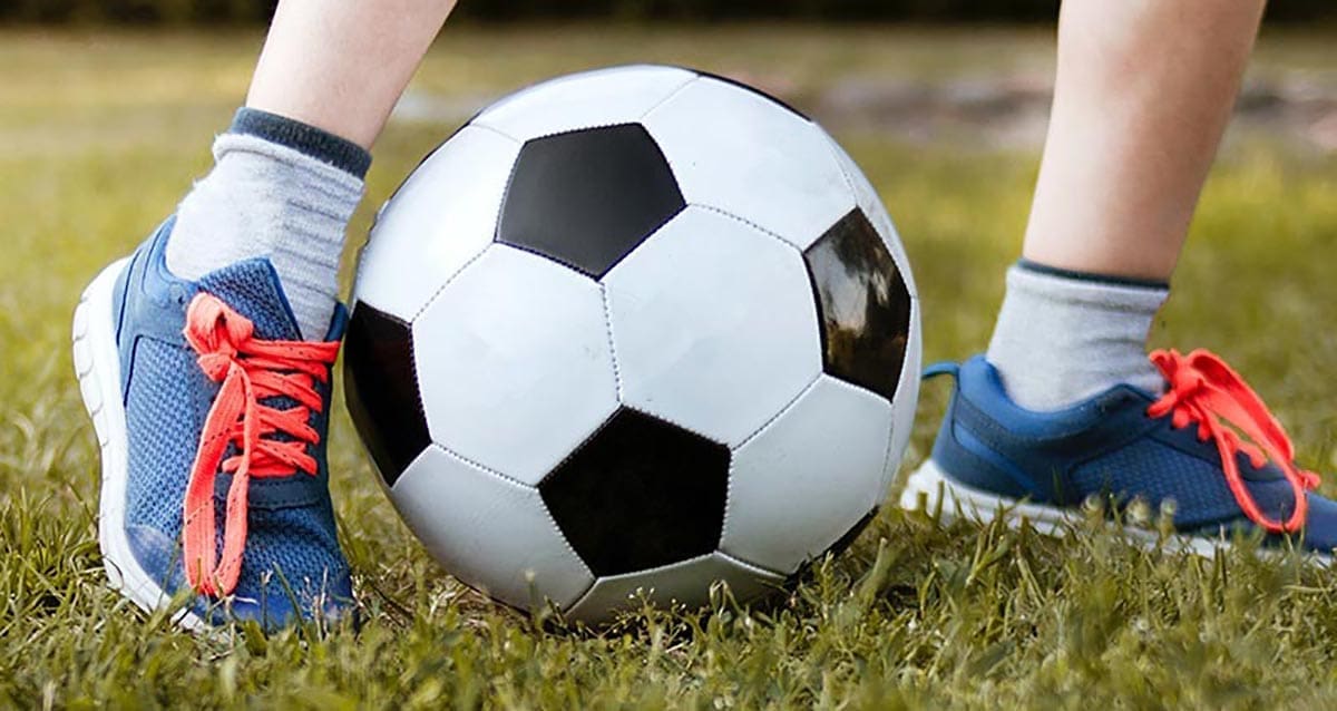 Mitigating Concussions - child playing soccer