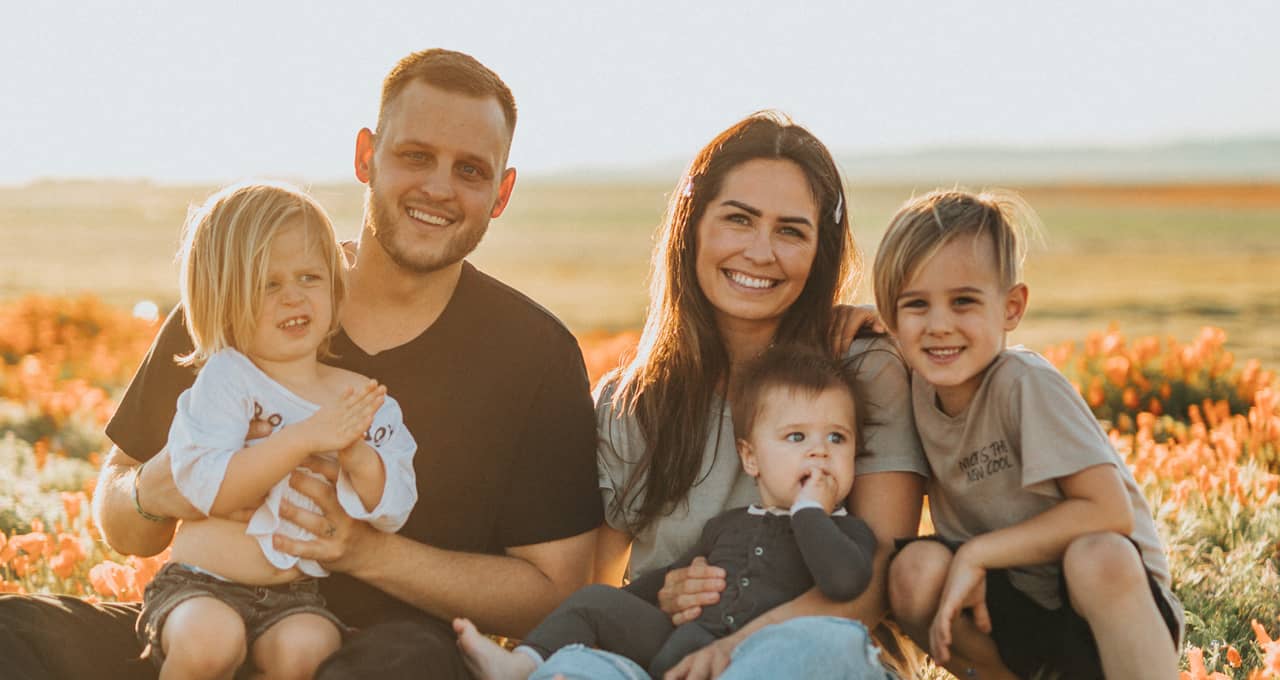 happy family in field