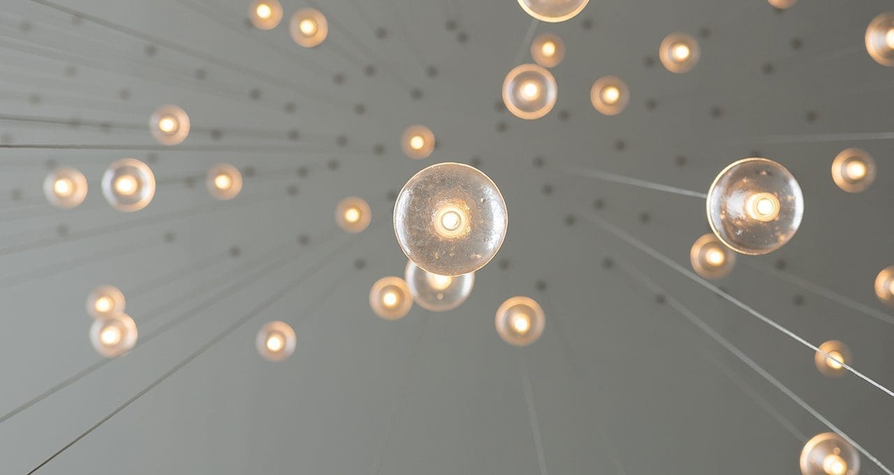 camera shot under edison bulb lights