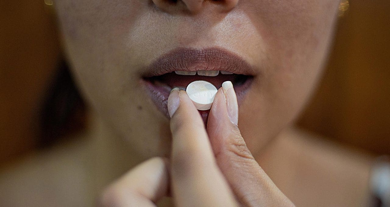 woamn taking pills