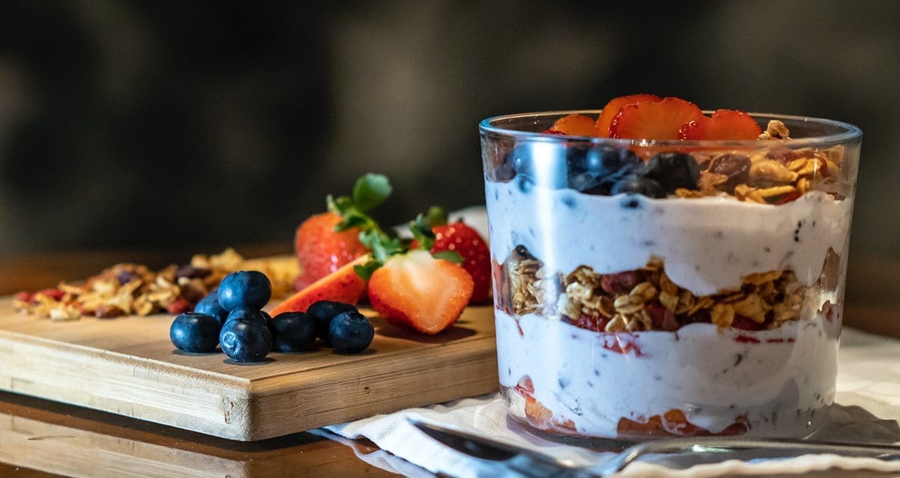yogurt parfait with fresh blueberries and strawberries