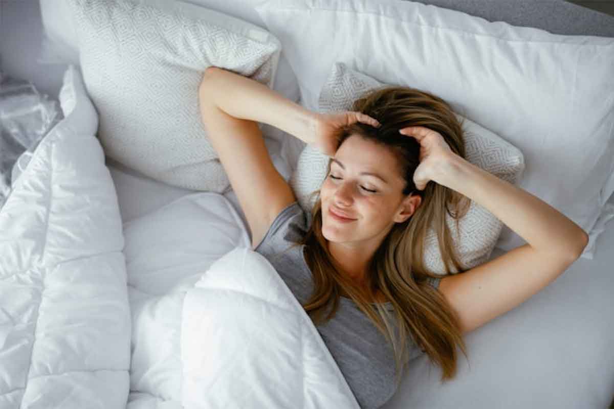 woman relaxing in bed