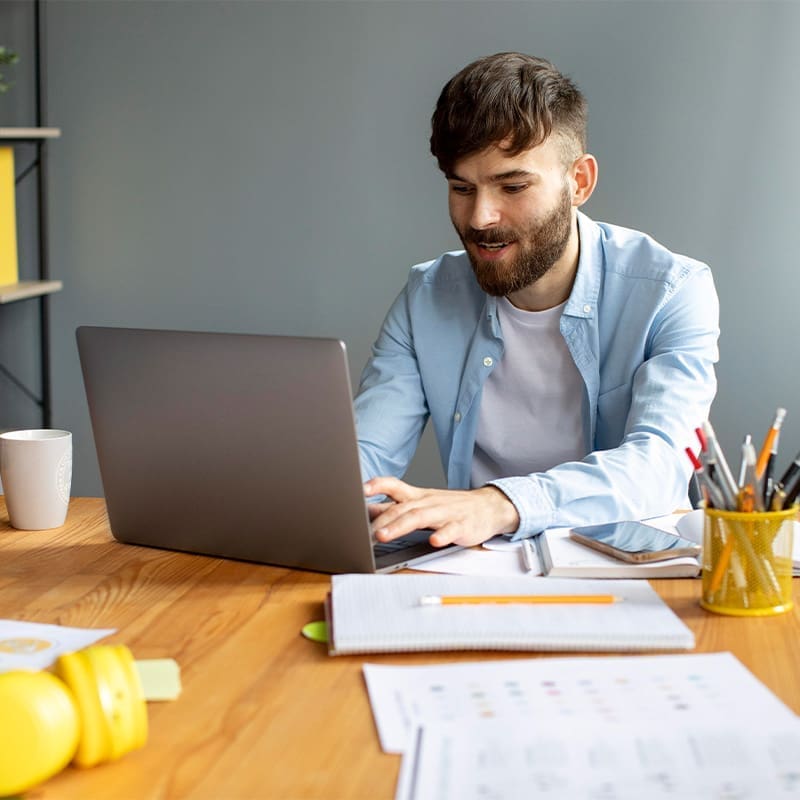 man on laptop working