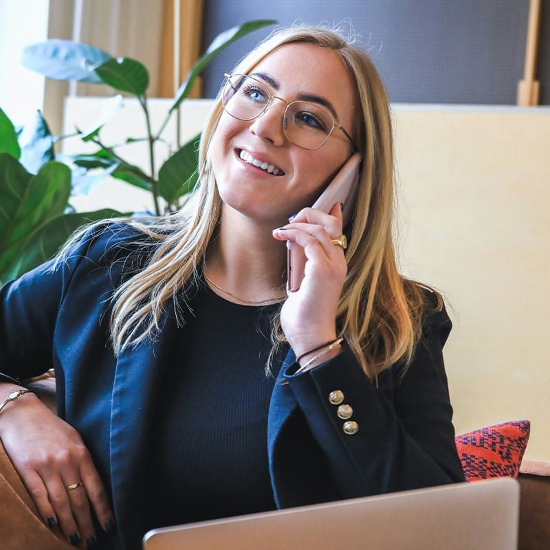 woman on the phone working