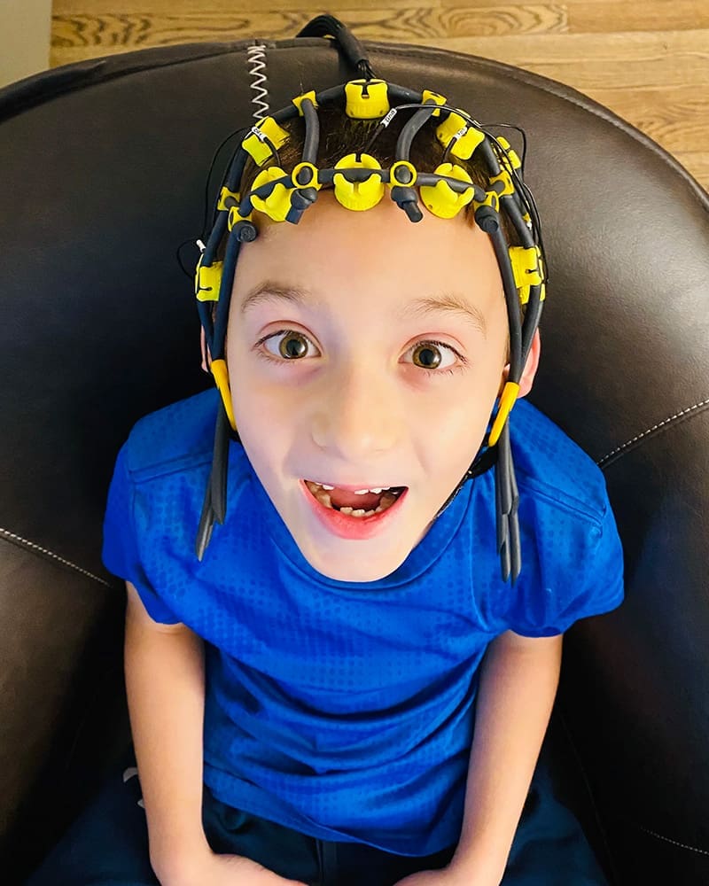 kid getting neurofeedback at Grey matters